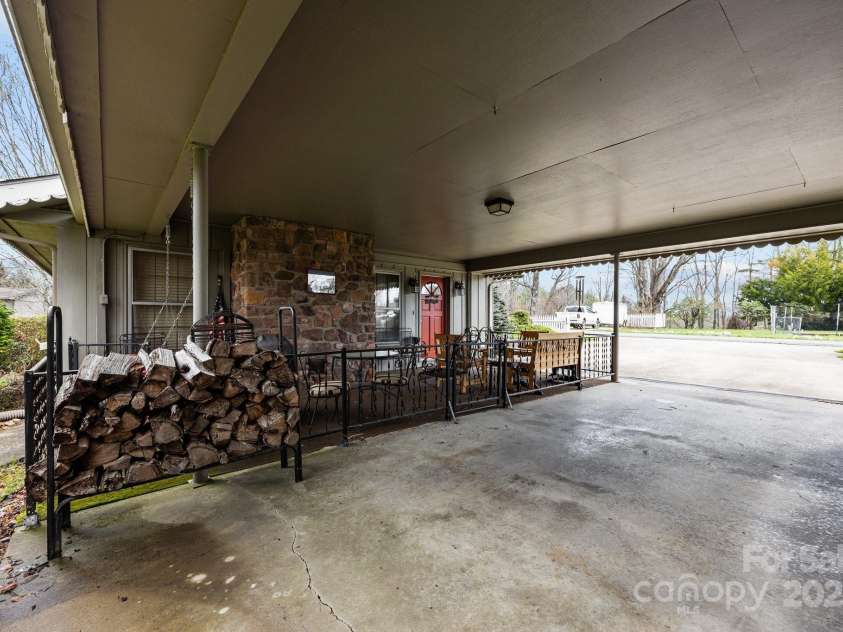 457 Overlook Drive, Spruce Pine, NC 287777.  MLS# CAR4245586, YatesRealty ID 2770. Covered parking in carport