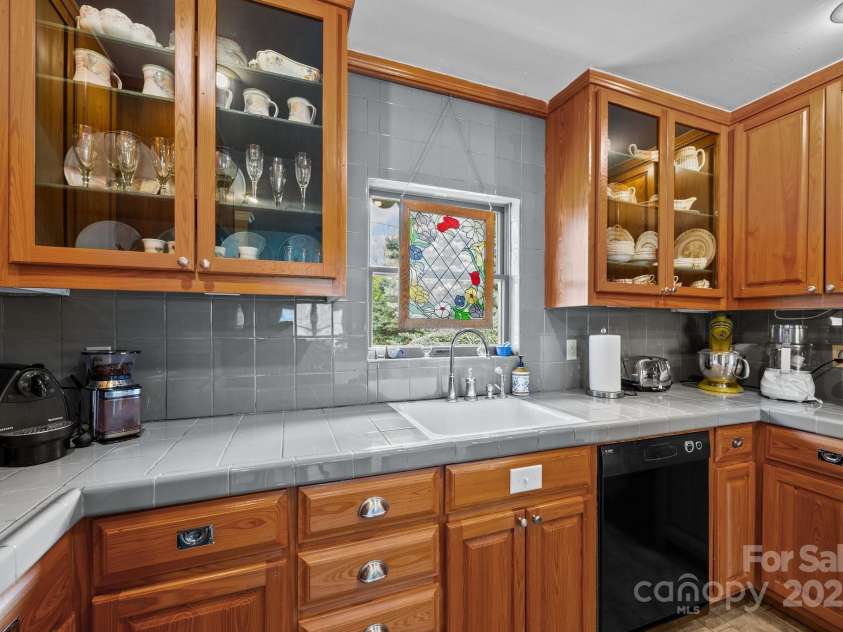 457 Overlook Drive, Spruce Pine, NC 287777.  MLS# CAR4245586, YatesRealty ID 2770. Tile countertops and backsplash