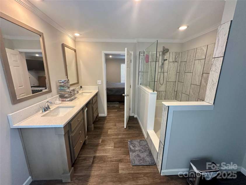 428 Long Branch Church Road, Jefferson, SC 29718.  MLS# CAR4270911, YatesRealty ID 27701. Double vanity in the ensuite bathroom