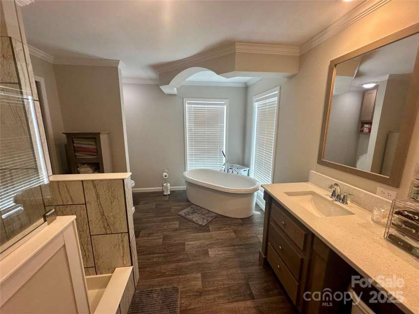428 Long Branch Church Road, Jefferson, SC 29718.  MLS# CAR4270911, YatesRealty ID 27701. Ensuite bathroom with huge walk in shower and deep soaking tub