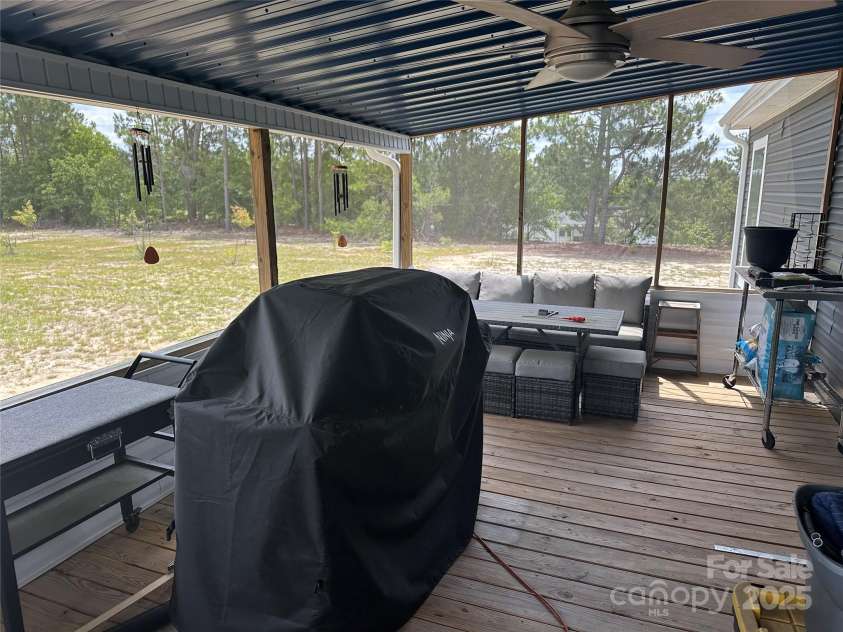 428 Long Branch Church Road, Jefferson, SC 29718.  MLS# CAR4270911, YatesRealty ID 27701. Rear screened deck