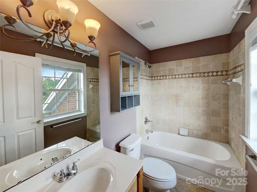 1000 Sarandon Drive, Matthews, NC 28104.  MLS# CAR4259521, YatesRealty ID 27703. 