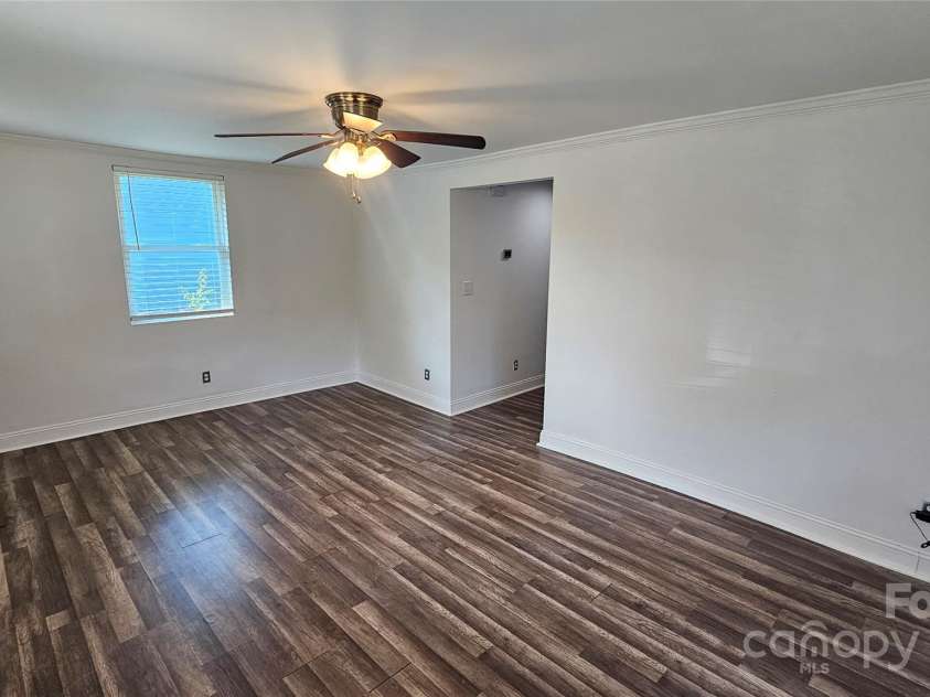 3400 Reid Avenue, Charlotte, NC 28208.  MLS# CAR4262745, YatesRealty ID 27704. Living Room