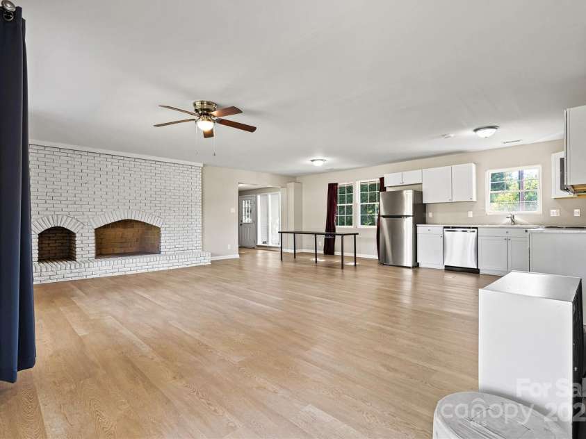 1516 Buffalo Shoals Road, Lincolnton, NC 28092.  MLS# CAR4281719, YatesRealty ID 27705. Upper Level - living room, kitchen and dining area