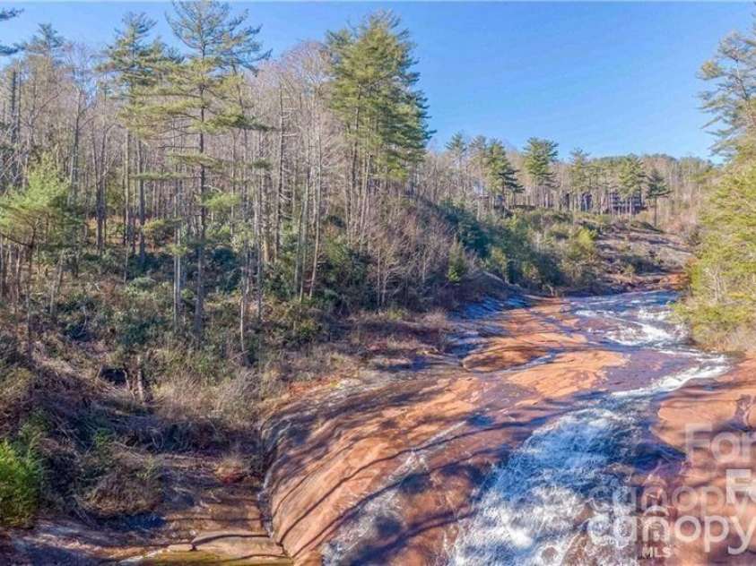 30 Lower Tanglewood Road, Lake Toxaway, NC 28747.  MLS# CAR4388779, YatesRealty ID 27705. Drone View 4