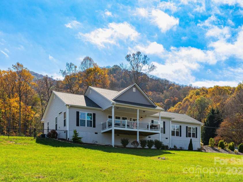 605 Red Bank Road, Waynesville, NC 28786.  MLS# CAR4313671, YatesRealty ID 27707. Additional views of mountains and back of home