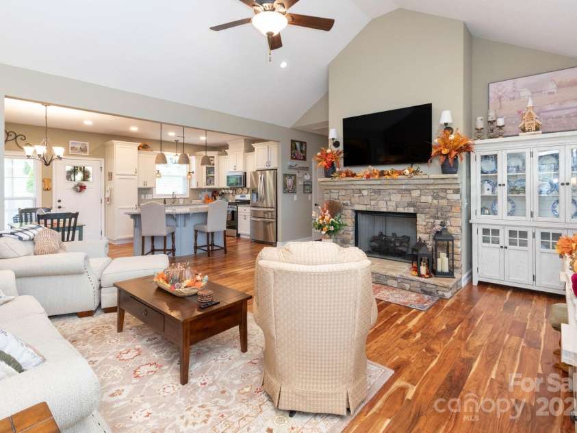 605 Red Bank Road, Waynesville, NC 28786.  MLS# CAR4313671, YatesRealty ID 27707. Cozy stone fireplace with gas log insert for ease of use.  Open concept living means everyone is together while entertaining.