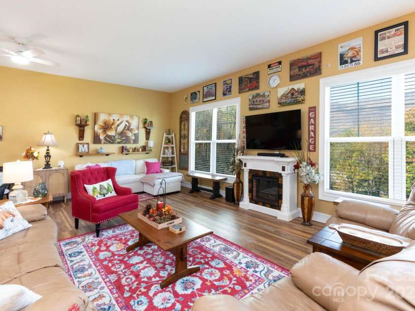 605 Red Bank Road, Waynesville, NC 28786.  MLS# CAR4313671, YatesRealty ID 27707. Electric fireplace, mountain views, and plenty of room for lounging and watching the game!