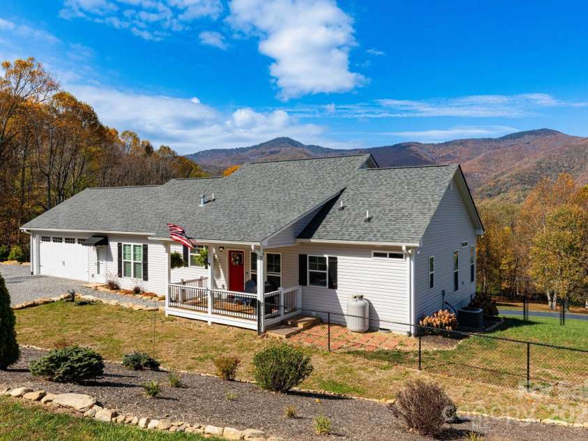 605 Red Bank Road, Waynesville, NC 28786.  MLS# CAR4313671, YatesRealty ID 27707. Front of home with side yard