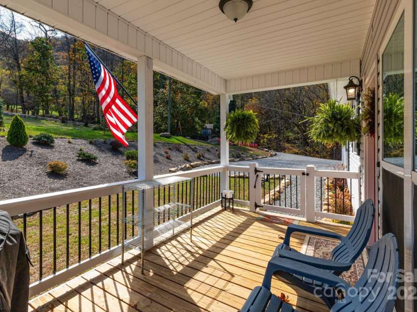 605 Red Bank Road, Waynesville, NC 28786.  MLS# CAR4313671, YatesRealty ID 27707. Front Porch is fully enclosed