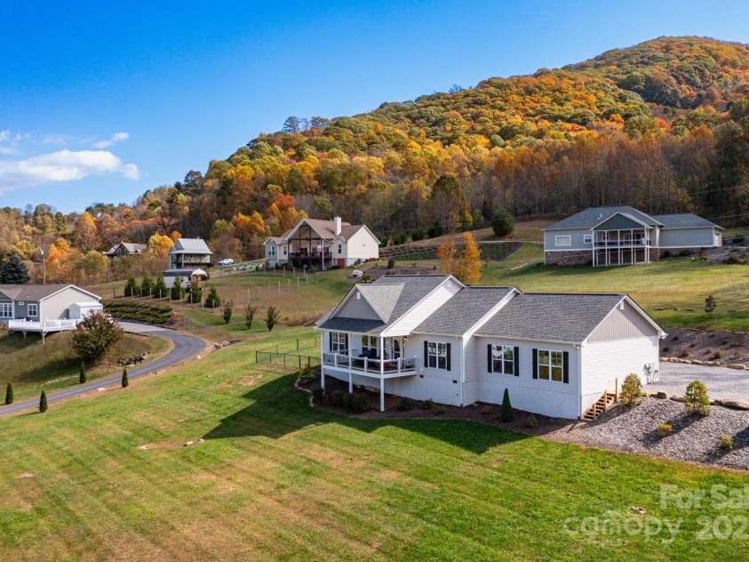 605 Red Bank Road, Waynesville, NC 28786.  MLS# CAR4313671, YatesRealty ID 27707. Huge lot with plenty of space for play or gardening