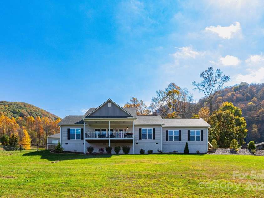 605 Red Bank Road, Waynesville, NC 28786.  MLS# CAR4313671, YatesRealty ID 27707. Rear of home and additional views of the mountains