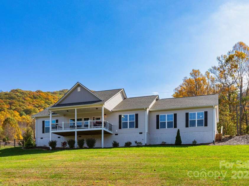 605 Red Bank Road, Waynesville, NC 28786.  MLS# CAR4313671, YatesRealty ID 27707. Rear of home and deck