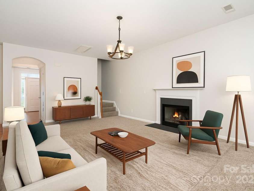 14911 Taggert Trail Drive, Charlotte, NC 28273.  MLS# CAR4270538, YatesRealty ID 27710. Living room virtually staged