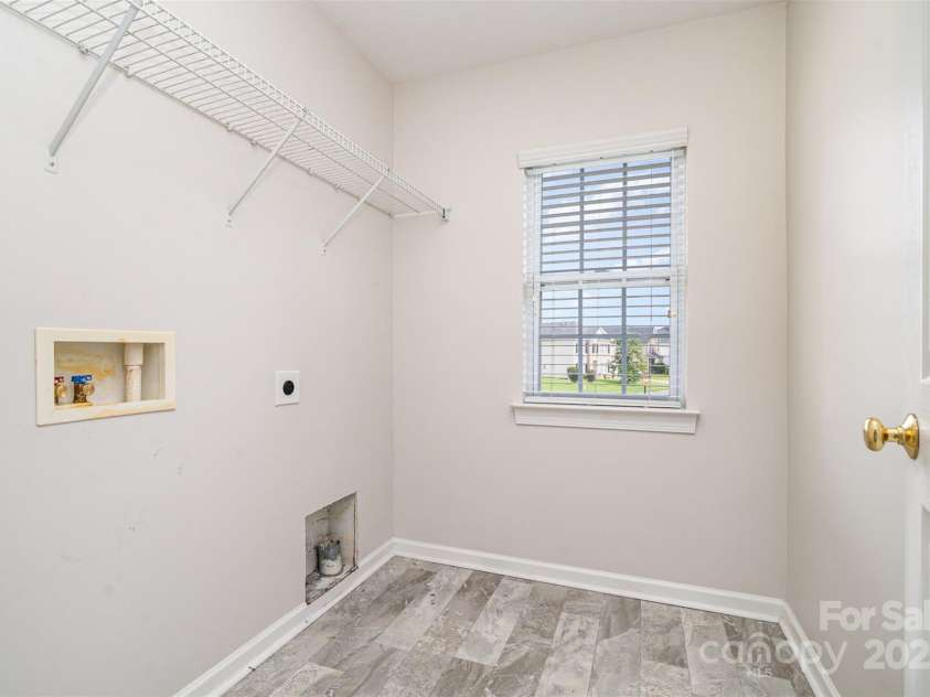 14911 Taggert Trail Drive, Charlotte, NC 28273.  MLS# CAR4270538, YatesRealty ID 27710. Upstairs laundry room