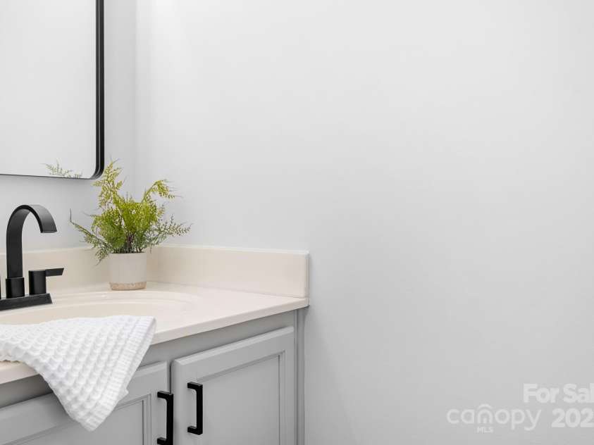 9911 Birch Knoll Court, Charlotte, NC 28213.  MLS# CAR4278633, YatesRealty ID 27712. Powder Room on Main Floor