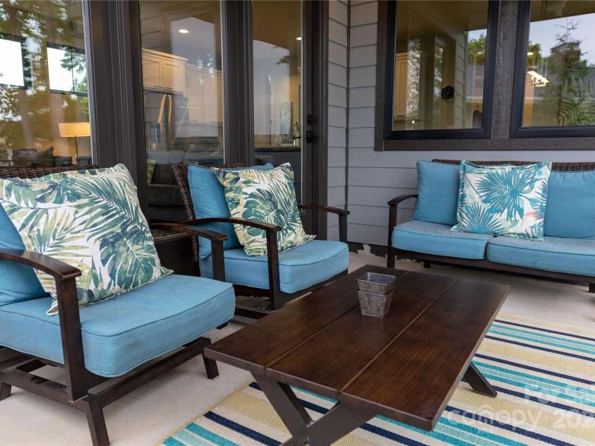 113 Angler Place, Mooresville, NC 28117.  MLS# CAR4217106, YatesRealty ID 2772. Covered outdoor veranda.