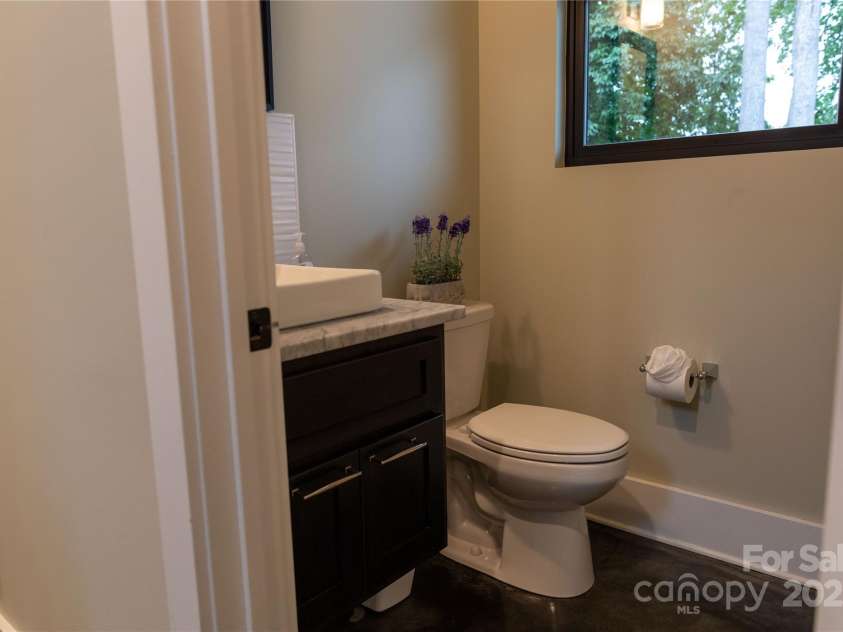 113 Angler Place, Mooresville, NC 28117.  MLS# CAR4217106, YatesRealty ID 2772. Half bath on the main level.