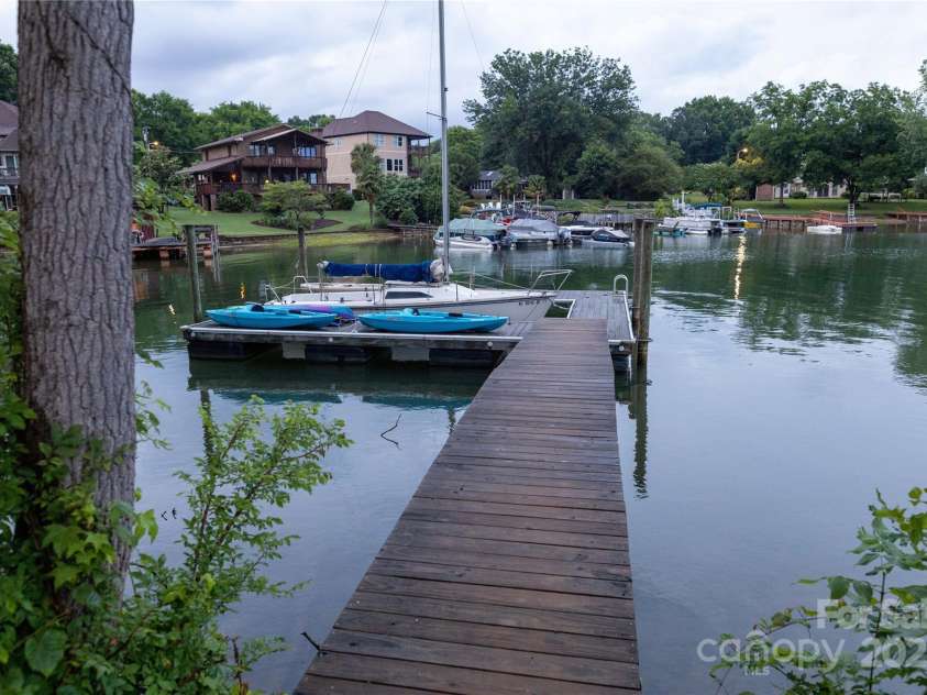 113 Angler Place, Mooresville, NC 28117.  MLS# CAR4217106, YatesRealty ID 2772. Let's go boating, kayaking or paddleboarding. The depth of the lake is around 7-8' during the average time.