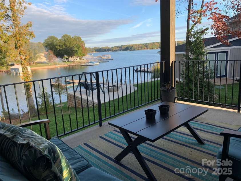 113 Angler Place, Mooresville, NC 28117.  MLS# CAR4217106, YatesRealty ID 2772. Outdoor veranda is fully fenced in overlooking Lake Norman