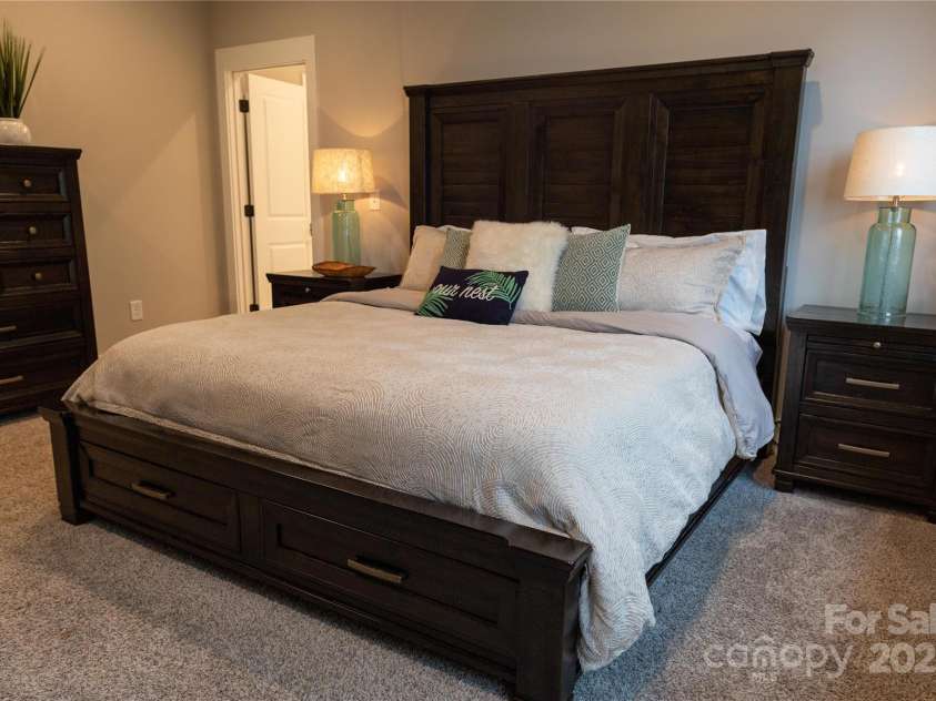 113 Angler Place, Mooresville, NC 28117.  MLS# CAR4217106, YatesRealty ID 2772. Primary bedroom leads you to your own luxury bathroom.