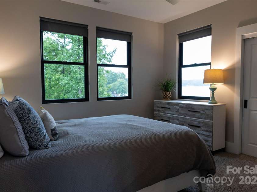 113 Angler Place, Mooresville, NC 28117.  MLS# CAR4217106, YatesRealty ID 2772. Secondary bedroom with views of the lake.