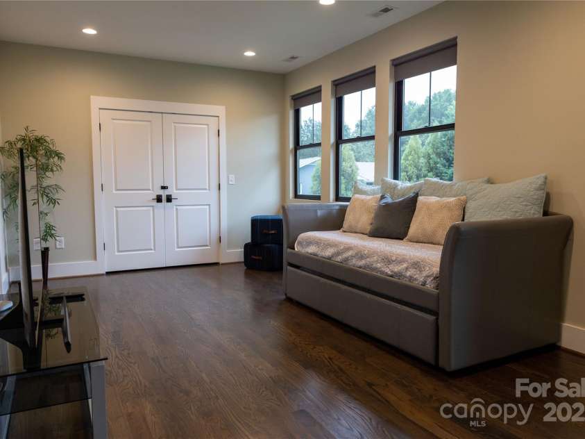 113 Angler Place, Mooresville, NC 28117.  MLS# CAR4217106, YatesRealty ID 2772. Upstairs den with hardwood floors and large storage closet.