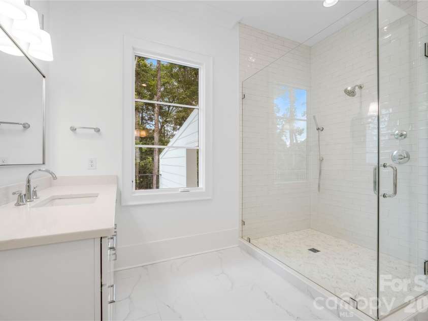 5042 Gilchrist Road, Charlotte, NC 28211.  MLS# CAR4389556, YatesRealty ID 27722. Primary Bathroom Up for Representation