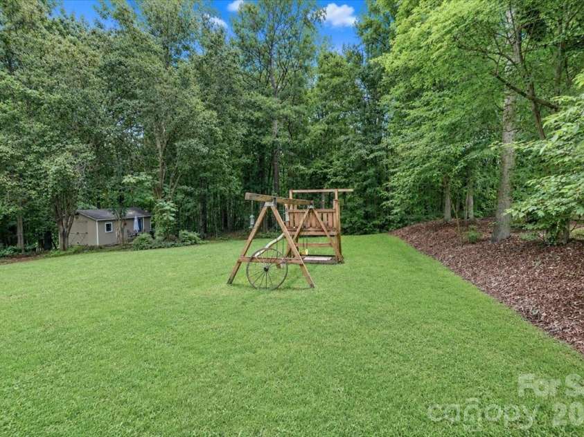 311 Deerfield Circle, Salisbury, NC 28147.  MLS# CAR4385691, YatesRealty ID 27728. Backyard with Playset