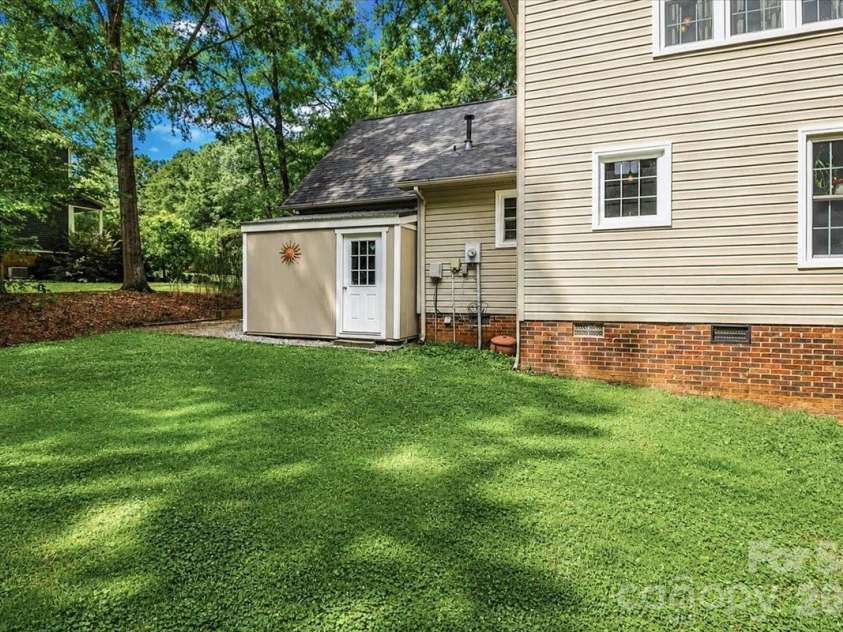 311 Deerfield Circle, Salisbury, NC 28147.  MLS# CAR4385691, YatesRealty ID 27728. Backyard with Storage Shed