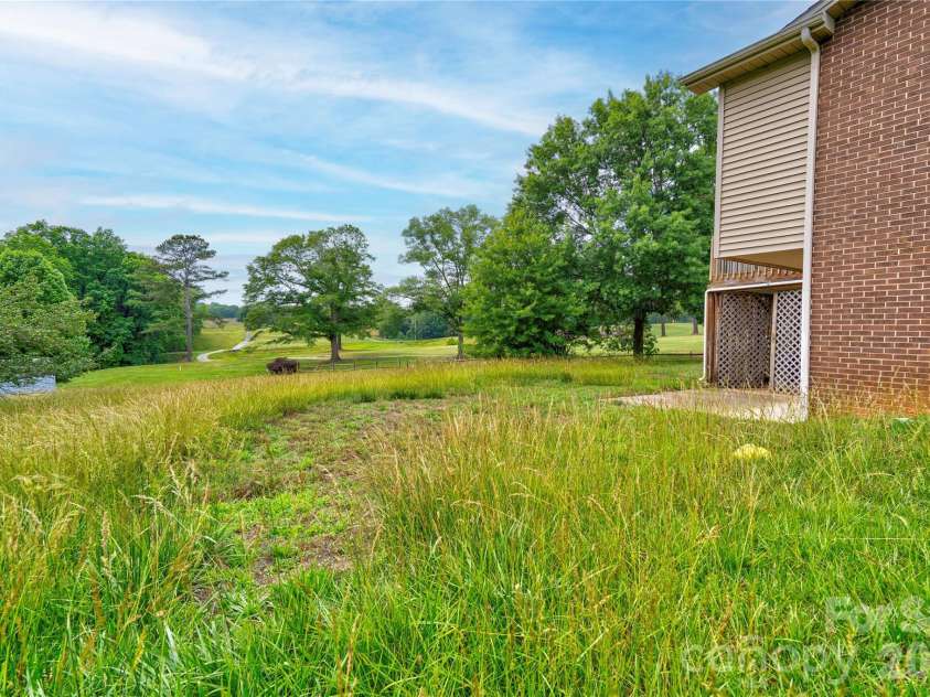 3016 Longwood Drive, Shelby, NC 28152.  MLS# CAR4389527, YatesRealty ID 27735. Back Yard
