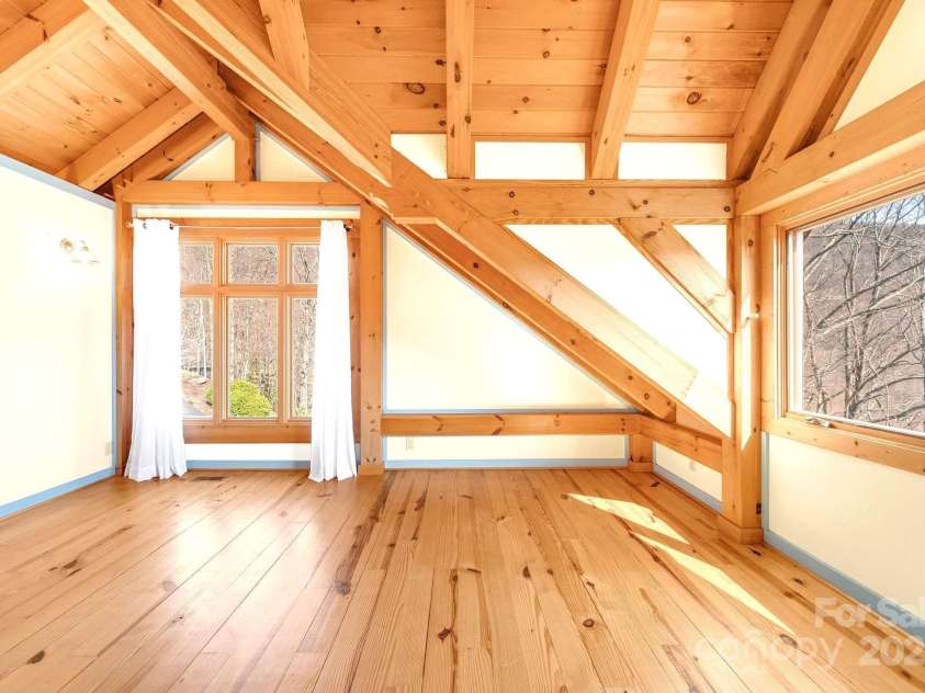 35 Great Aspen Way, Black Mountain, NC 28711.  MLS# CAR4243121, YatesRealty ID 27735. Light & Bright Primary Bedroom