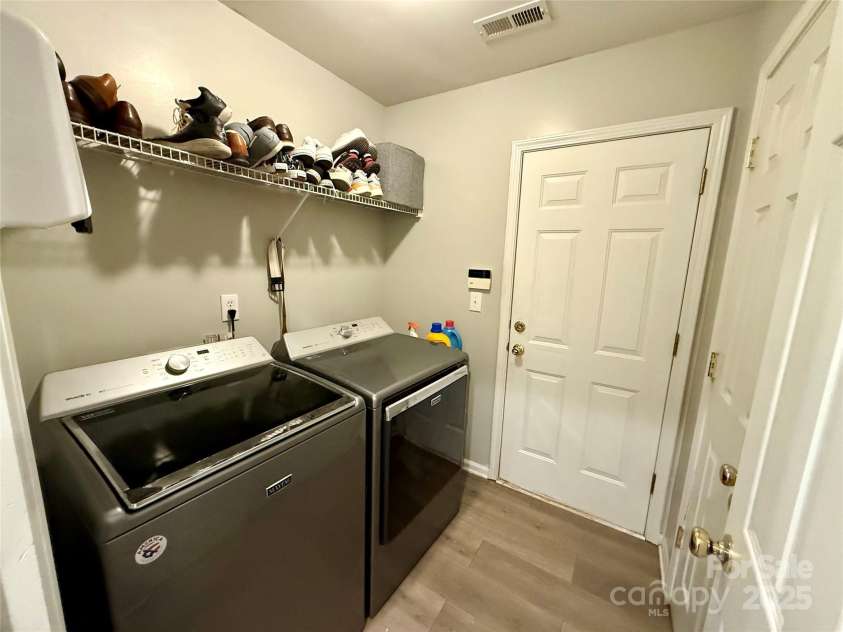 7267 Sandown Court, Harrisburg, NC 28075.  MLS# CAR4268335, YatesRealty ID 27737. Laundry room - washer and dryer are NOT included with sale