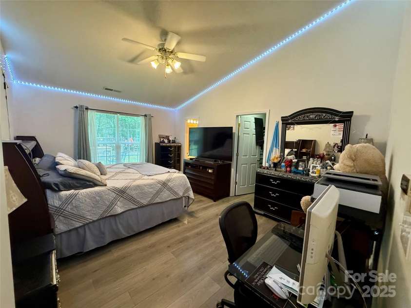 7267 Sandown Court, Harrisburg, NC 28075.  MLS# CAR4268335, YatesRealty ID 27737. Primary bedroom
