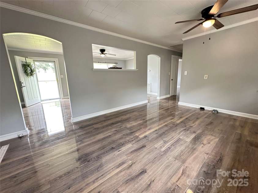 60 White Oaks Drive, Taylorsville, NC 28681.  MLS# CAR4273821, YatesRealty ID 27738. Kitchen looking into living area