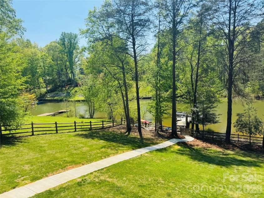 6923 Wateredge Drive, Sherrills Ford, NC 28673.  MLS# CAR4316693, YatesRealty ID 2774. Beautiful pathway down to the private boat slip and Lake 