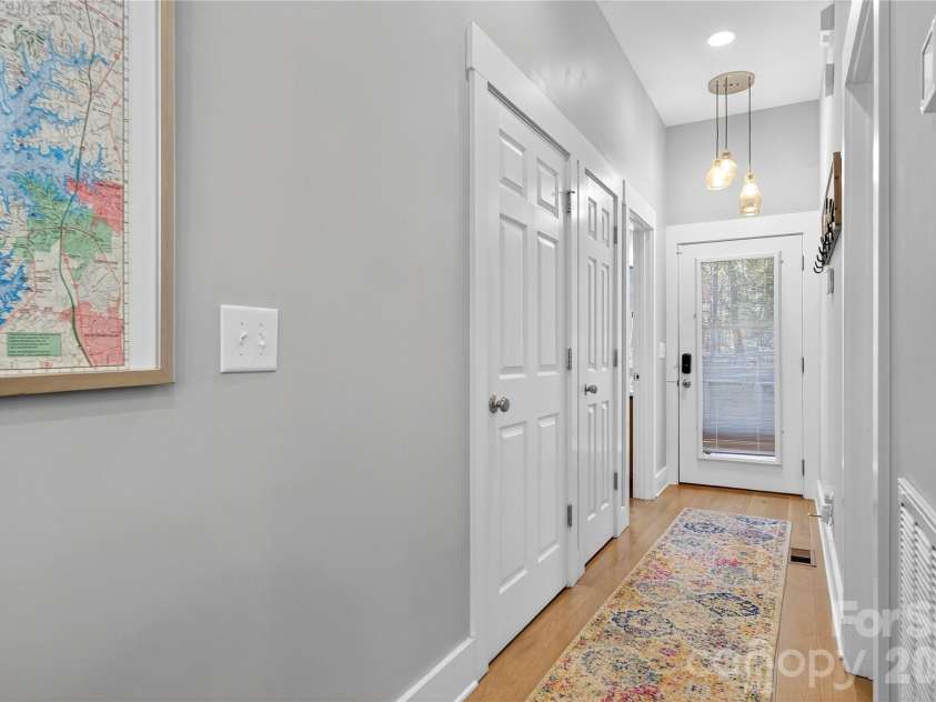 6923 Wateredge Drive, Sherrills Ford, NC 28673.  MLS# CAR4316693, YatesRealty ID 2774. Front Door with spacious hallway leading to the open kitchen/family/dining area