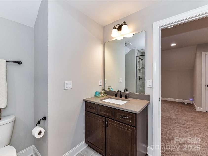 1805 Axholme Court, Waxhaw, NC 28173.  MLS# CAR4298904, YatesRealty ID 27747. Guest bath upstairs