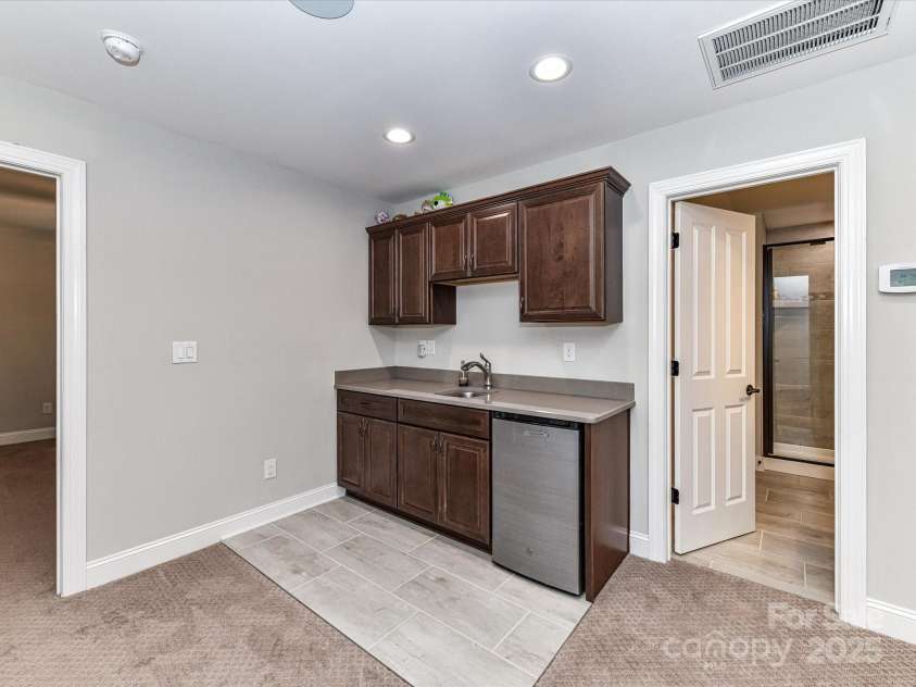 1805 Axholme Court, Waxhaw, NC 28173.  MLS# CAR4298904, YatesRealty ID 27747. Upstairs mini-kitchen