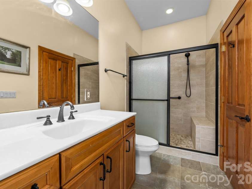 226 Sawgrass Drive, Whittier, NC 28789.  MLS# CAR4389476, YatesRealty ID 27747. Guest Bathroom