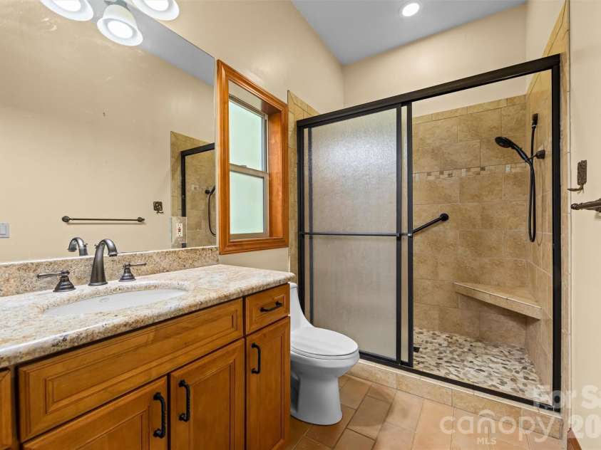 226 Sawgrass Drive, Whittier, NC 28789.  MLS# CAR4389476, YatesRealty ID 27747. Primary Bathroom