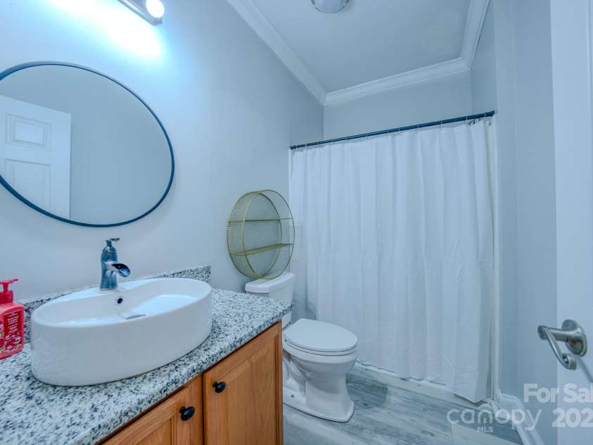 27 Garland Ball Drive, Alexander, NC 28701.  MLS# CAR4251510, YatesRealty ID 27749. 2nd full bath on main level