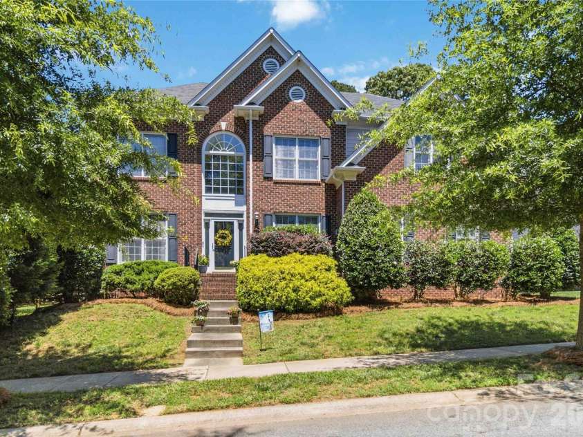 7915 Bytham Castle Drive, Huntersville, NC 28078.  MLS# CAR4380718, YatesRealty ID 27750. Stately brick front MacAulay home!
