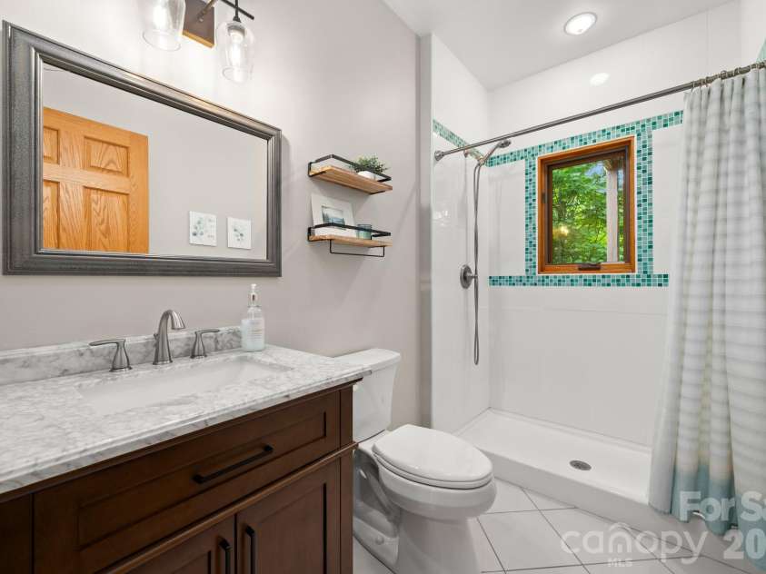 49 Western Eagle Drive, Hendersonville, NC 28792.  MLS# CAR4389447, YatesRealty ID 27755. 