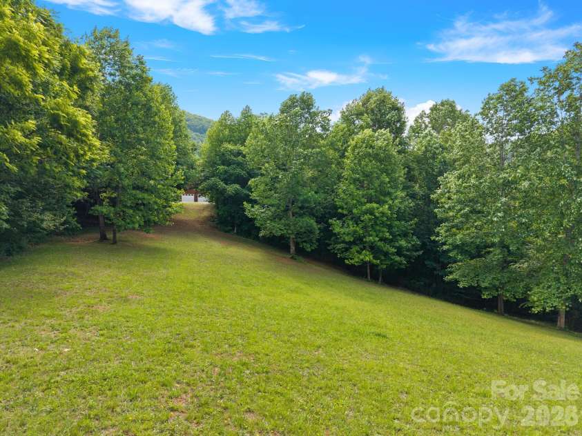 49 Western Eagle Drive, Hendersonville, NC 28792.  MLS# CAR4389447, YatesRealty ID 27755. 