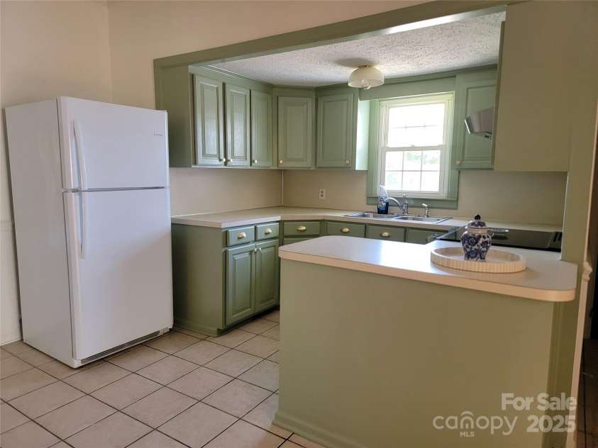 309 11th Street, Kannapolis, NC 28083.  MLS# CAR4255485, YatesRealty ID 27757. 