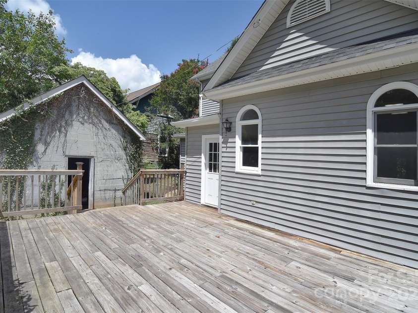 1707 Main Street, Salisbury, NC 28144.  MLS# CAR4281893, YatesRealty ID 27758. Deck with shed in background