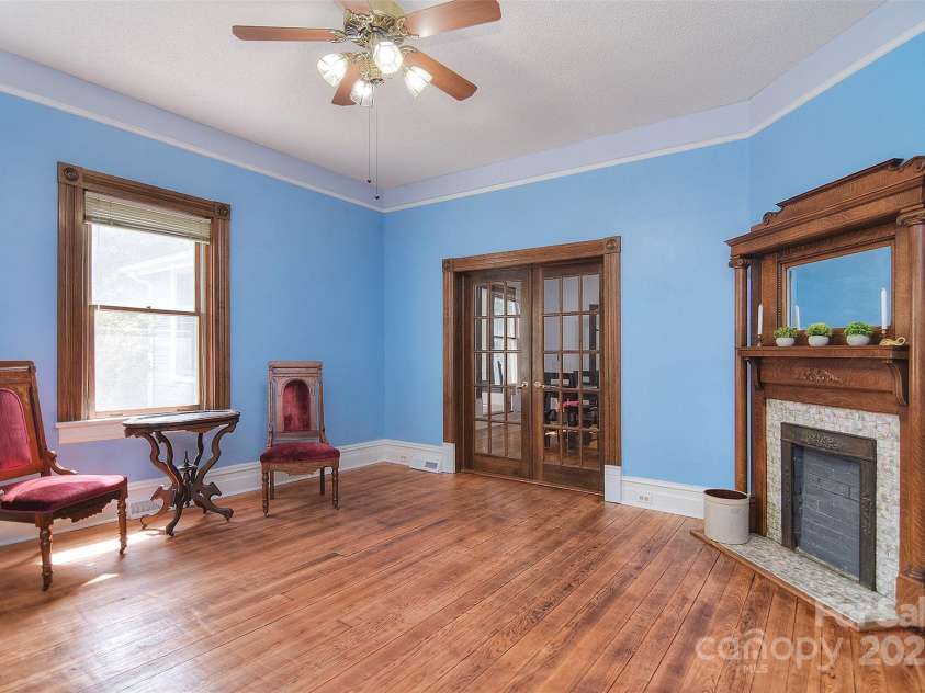 1707 Main Street, Salisbury, NC 28144.  MLS# CAR4281893, YatesRealty ID 27758. Living Room with French doors to dining room