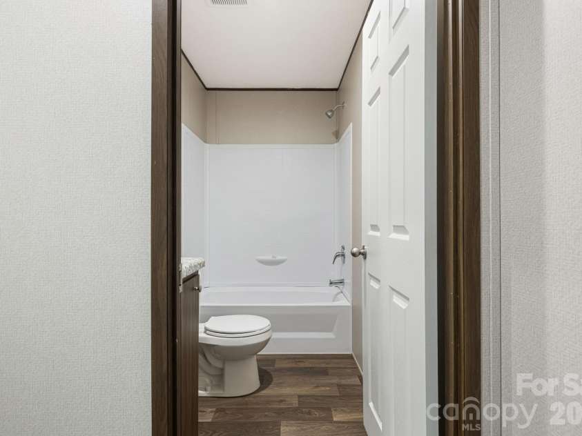 67 Vista Drive, Nebo, NC 28761.  MLS# CAR4389784, YatesRealty ID 27759. Guest bathroom