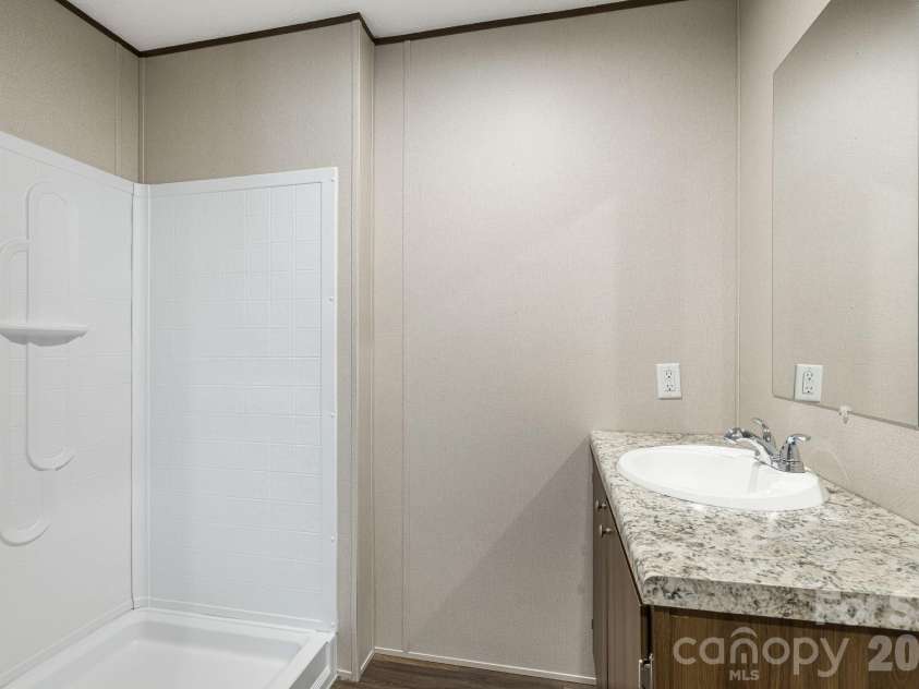 67 Vista Drive, Nebo, NC 28761.  MLS# CAR4389784, YatesRealty ID 27759. Guest bathroom